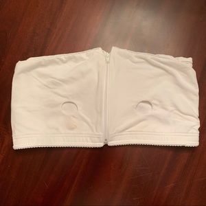 White Medela pumping bra.